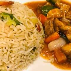 A picture of Fried rice and shashlik.