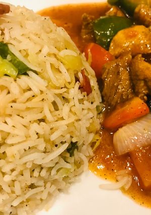 A picture of Fried rice and shashlik.