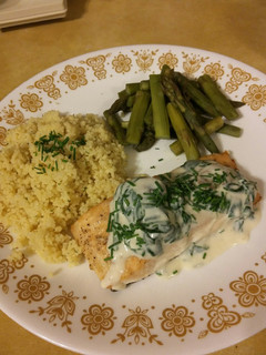 A picture of Baked Salmon with Spinach Mushroom Sauce.