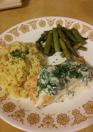 A picture of Baked Salmon with Spinach Mushroom Sauce.