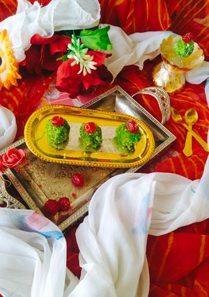 A picture of PAAN COCONUT LADDU / BETEL leaf laddu/ Milkmaid paan coconut laddu.