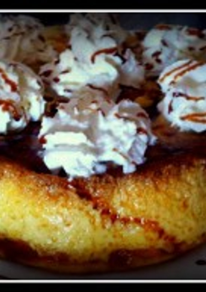 Una foto de Pudín de pan y chocolate blanco
