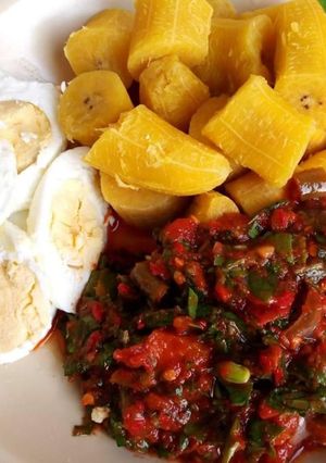 A picture of Boiled plantain,egg and vegetable sauce.