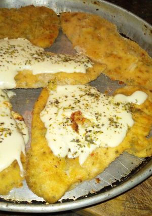 Una foto de Milanesas de pollo con mostaza y hierbas