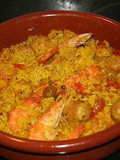 Una foto de Arroz con gambas, longaniza y dulce