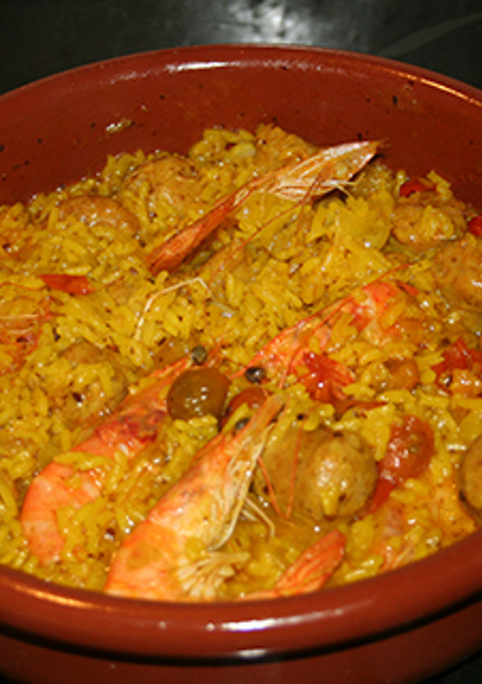 Una foto de Arroz con gambas, longaniza y dulce