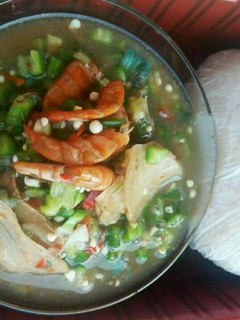 A picture of Sea food with Okro soup and pounded yam.