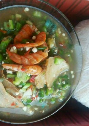 A picture of Sea food with Okro soup and pounded yam.