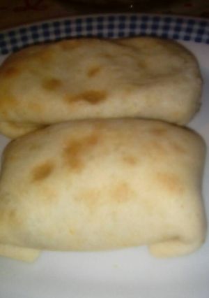 Una foto de Paquetitos de espinaca, ricota y nuez