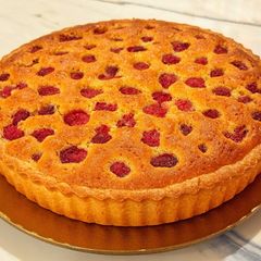 A picture of Almond and raspberry frangipane tart.