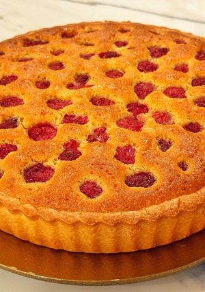 A picture of Almond and raspberry frangipane tart.