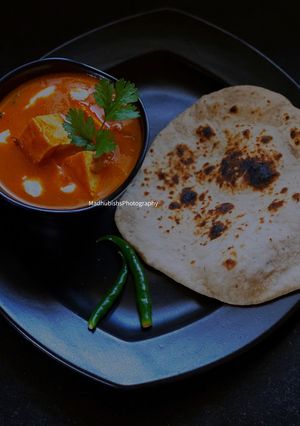 A picture of Paneer Butter Masala & Tandoori Roti.