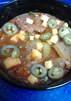 A picture of Bacon, sausage, and green tomato chili.
