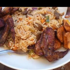 Jollof rice ans fried plantain A picture of Jollof rice ans fried plantain.