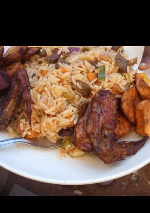A picture of Jollof rice ans fried plantain.