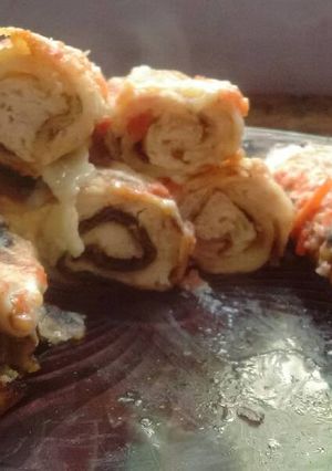 Una foto de Canelones de pollo a la Rossini
