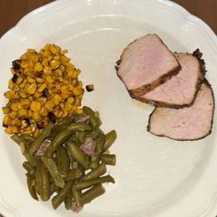A picture of Garlic and Herb Marinated Pork Tenderloin with Green Beans and Fire Roasted Corn.