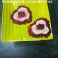 A picture of Beetroot cucumber sandwich.