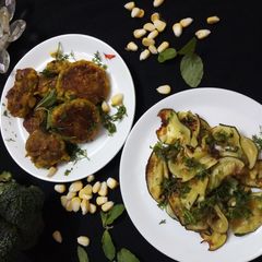 A picture of Italian marinated zucchini with broccoli cheese pattice.