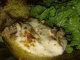 Zapallitos rellenos con guarnición de arroz amarillo