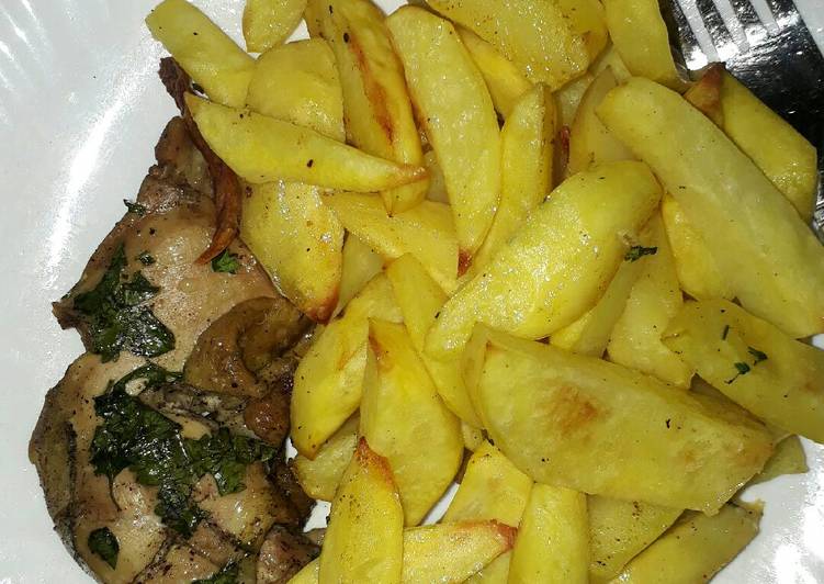 Baked chicken served with fries