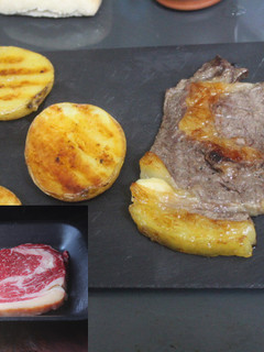 Una foto de Entrecot con patatas al grill doble