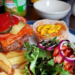 A picture of Home made beef burgers.