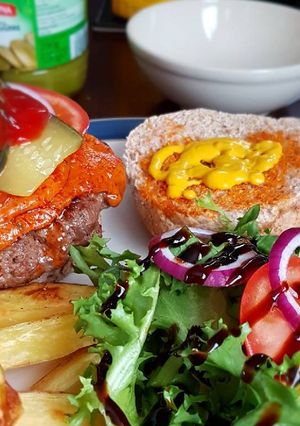 A picture of Home made beef burgers.