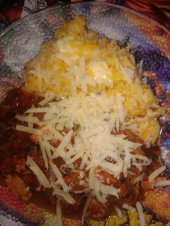 Una foto de Arroz amarillo con pollo y vegetales