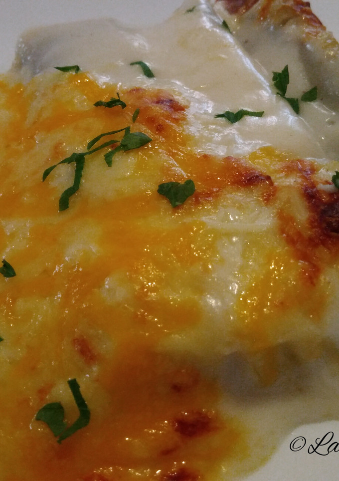 Una foto de Canelones de espinacas