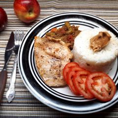 A picture of Grilled fillet served with rice.
