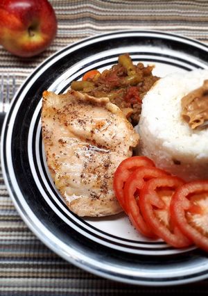 A picture of Grilled fillet served with rice.