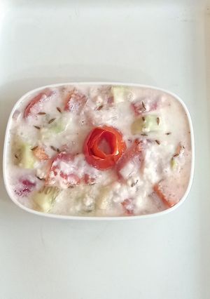 A picture of Vegetables raita🥒🍅🥒🧅.