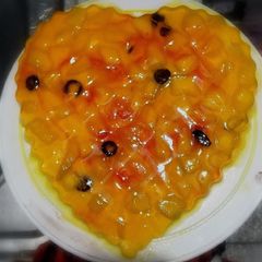 A picture of Mango Custard with Mango Jelly Frosting.