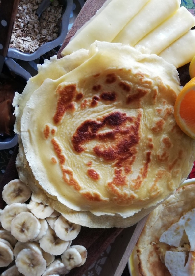 Una foto de Panqueques con dulce de leche