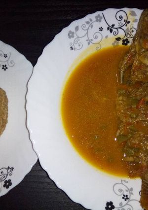 A picture of Stewed Fish with Brown Ugali.