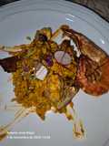 Arroz con camagroc, secreto, alcachofas..