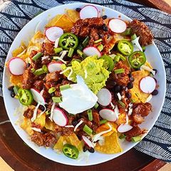 A picture of Chile Braised Wagyu Short Ribs Nachos.