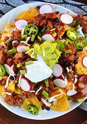 A picture of Chile Braised Wagyu Short Ribs Nachos.