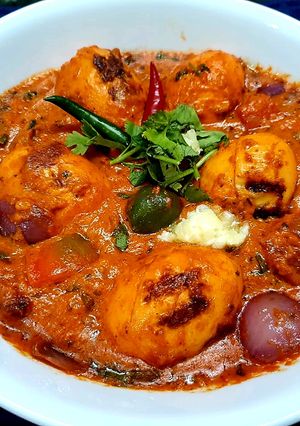 A picture of Tandoori Egg Tikka Masala.