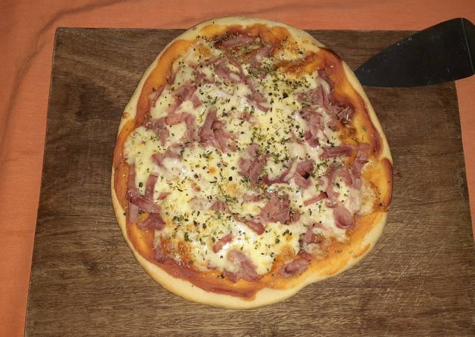 Pizza a la piedra Receta de Gerald- Cookpad