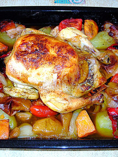 Una foto de Pollo al horno con verdura variada