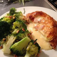 A picture of Baked Camembert in Puff Pastry with Broccoli and Sage Butter.