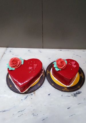 A picture of Blood red heart shape cake.