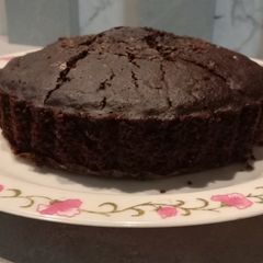 A picture of Healthy Oats Cake with Hershey's chocolate and Cocoa.