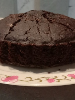 A picture of Healthy Oats Cake with Hershey's chocolate and Cocoa.