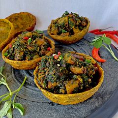 A picture of Methi aloo in methi katori poori.