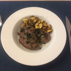 A picture of Healthy fillet steak with yellow zucchini 🥩.