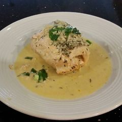 A picture of Salmon Fillets Cordon Bleu In a Lemon/ Lime Butter Sauce.