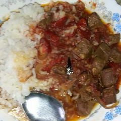 A picture of Liver stew and rice.